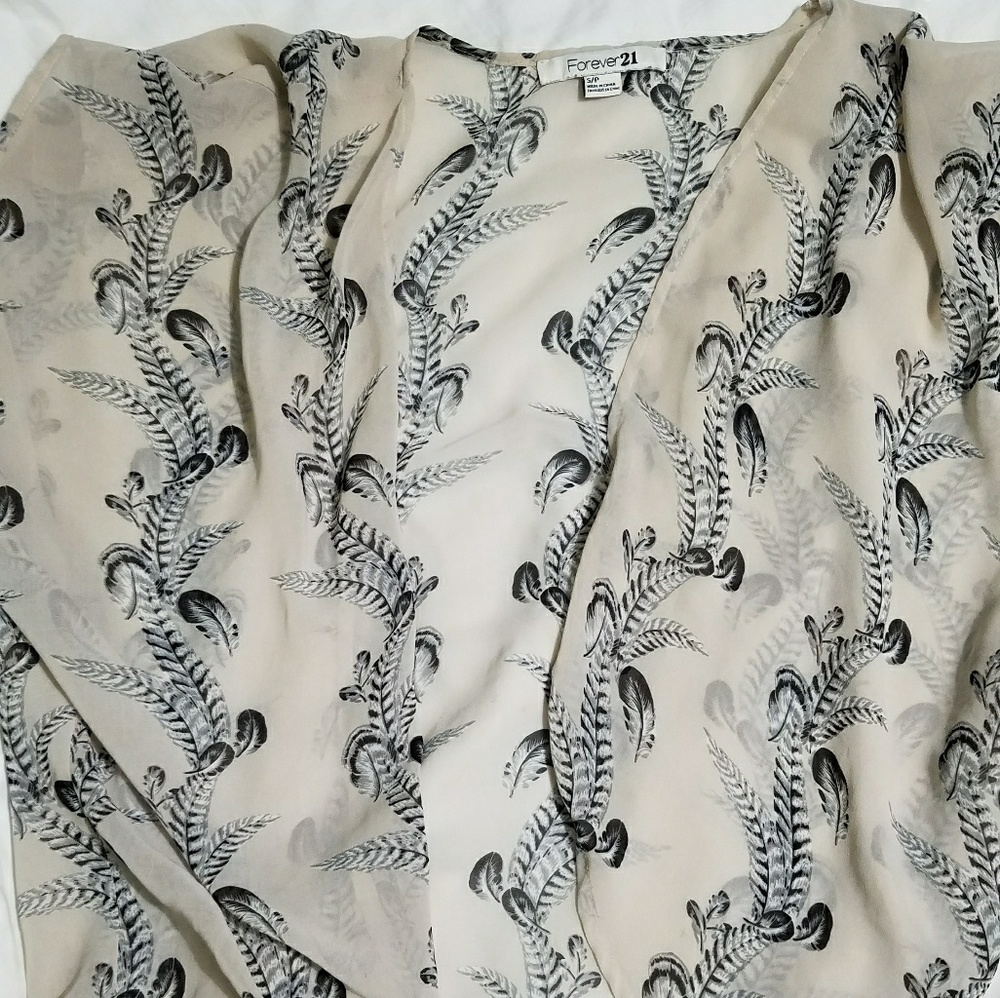 Sheer feather patterned top